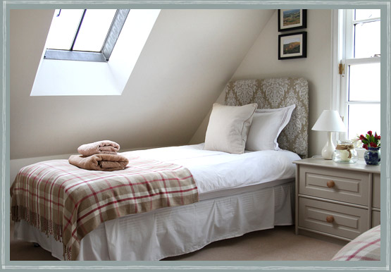 Twin bedroom at The Arns Cottage